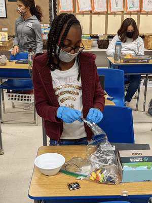 Student using climate action kit